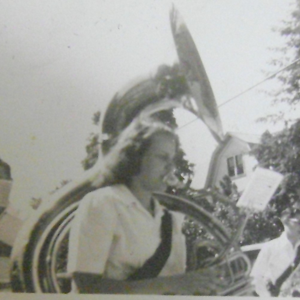 Sue marching with her sousaphone