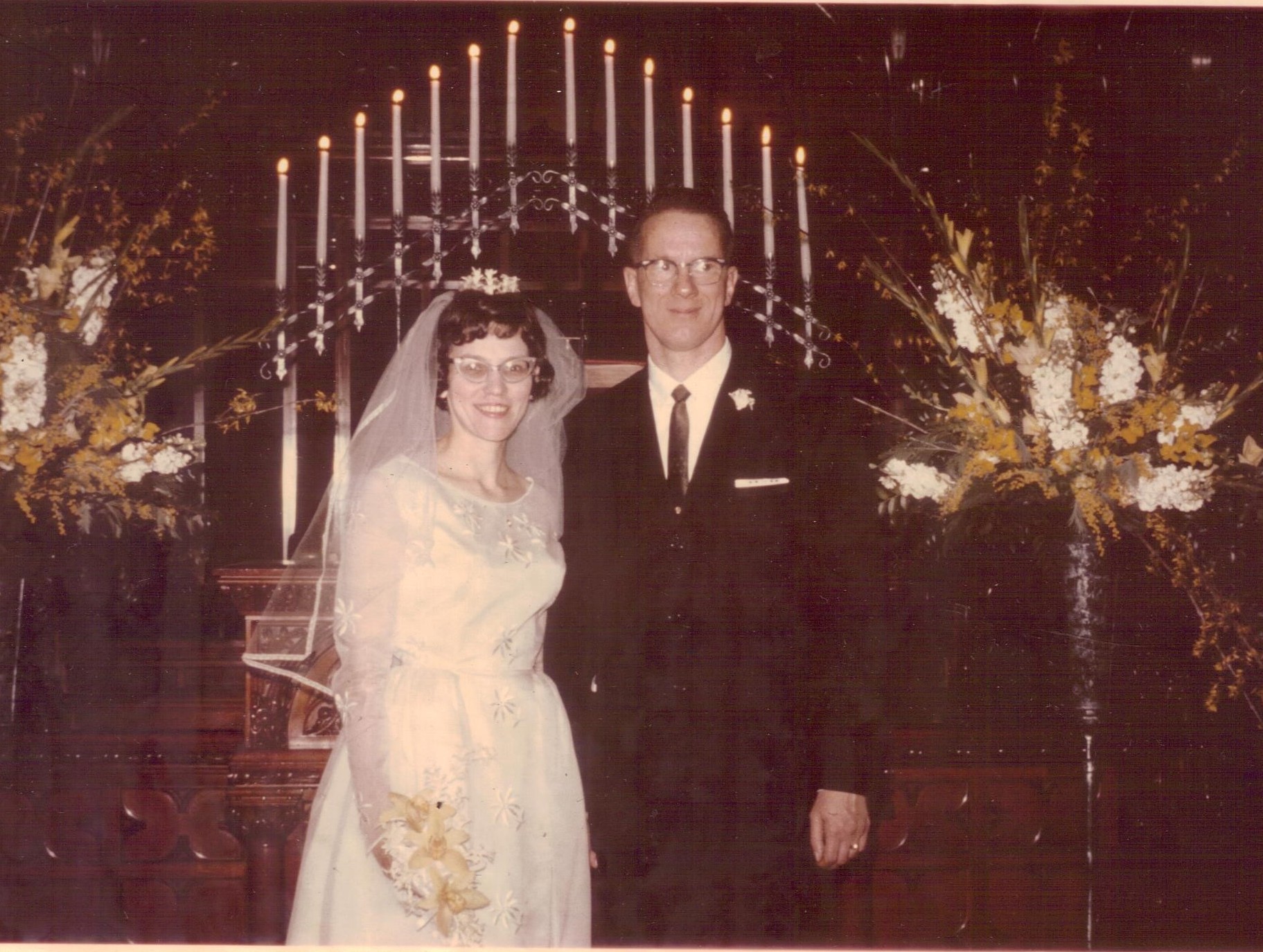 couple in front of the altar